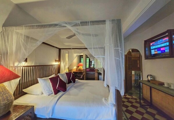 Camera Deluxe con letto matrimoniale o 2 letti singoli | Una scrivania, ferro/asse da stiro, Wi-Fi gratuito