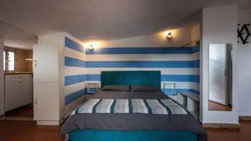 1 chambre, fer et planche Ă repasser, Wi-Fi gratuit, draps fournis