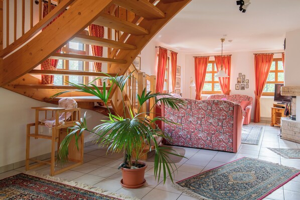 TV, fireplace, books, stereo