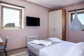 7 عدّة غرف نوم ومكواة/لوح كي وخدمة الإنترنت وملاءات أسرّة