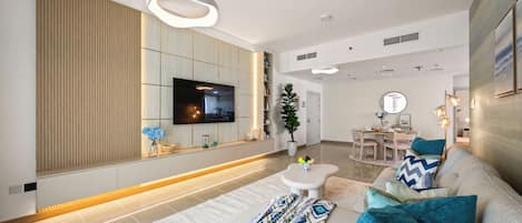 Apartment, Sea View | Living room | 65-inch Smart TV with digital channels, Netflix, streaming services