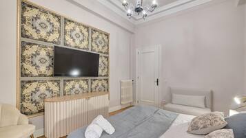 Een strijkplank/strijkijzer, wifi, beddengoed