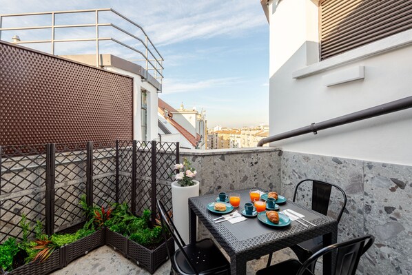 Suite, City View | Terrace/patio