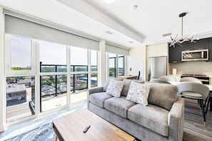 Business Apartment, 3 Bedrooms, Non Smoking | Living area | 50-inch Smart TV with digital channels