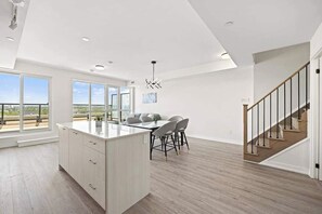 Club Apartment, 3 Bedrooms, Non Smoking | Living area | 50-inch Smart TV with digital channels - Contemporary Stays in the Heart of the Stockyards (Toronto)