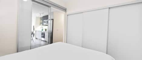 Townhome, Non Smoking, City View | Iron/ironing board, free WiFi, bed sheets