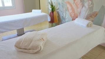 Couples treatment rooms, deep-tissue massages, body scrubs, facials