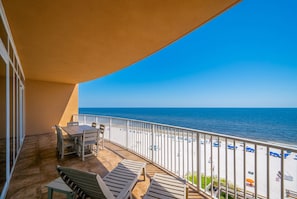 A balcony with a view of the beach and ocean. - Phoenix Orange Beach 605 3 Bedroom Condo (Orange Beach)