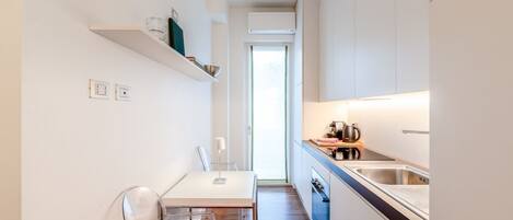 Fridge, stovetop, dishwasher, electric kettle