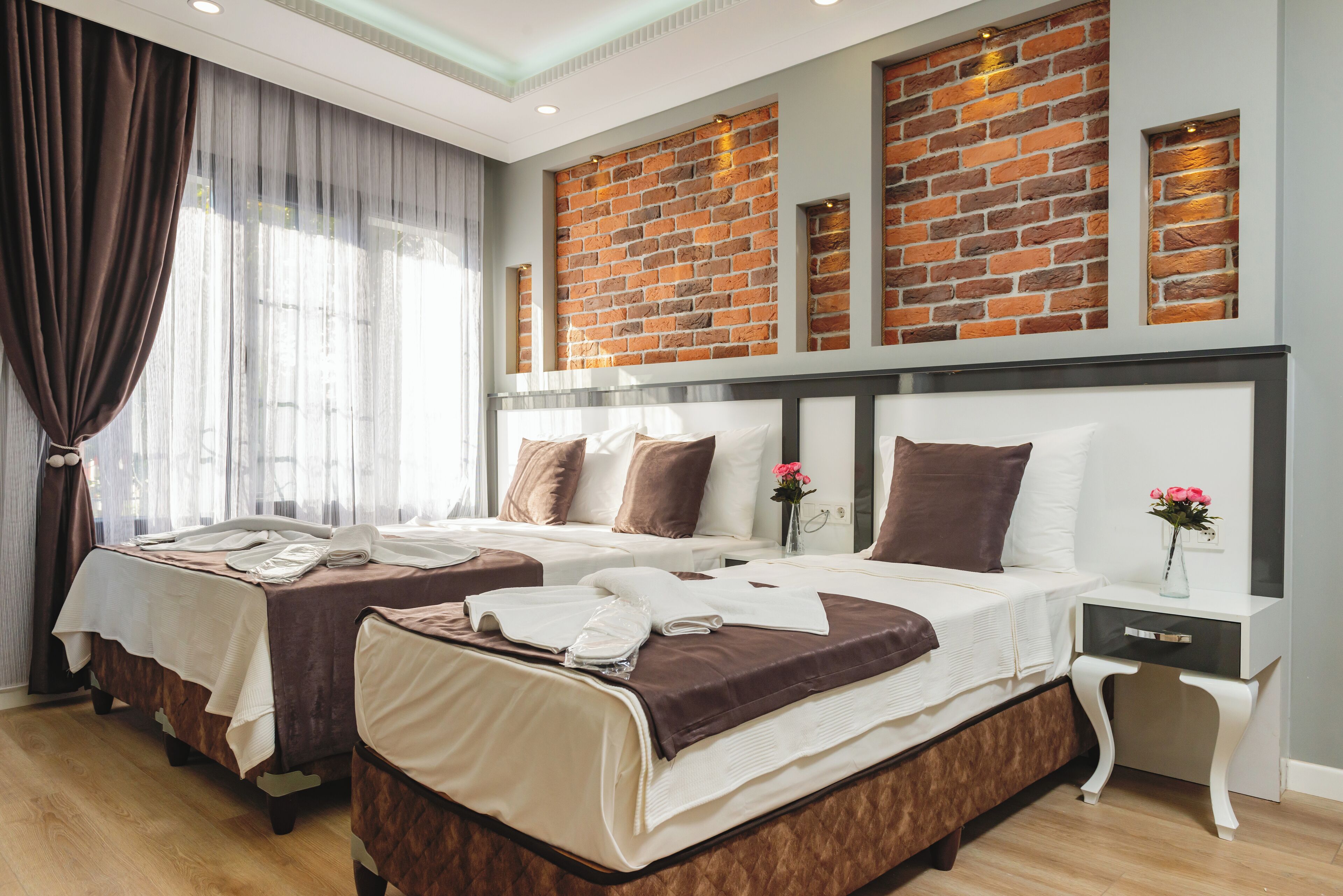 Habitación cuádruple Confort | Caja de seguridad en la habitación y wifi gratis 