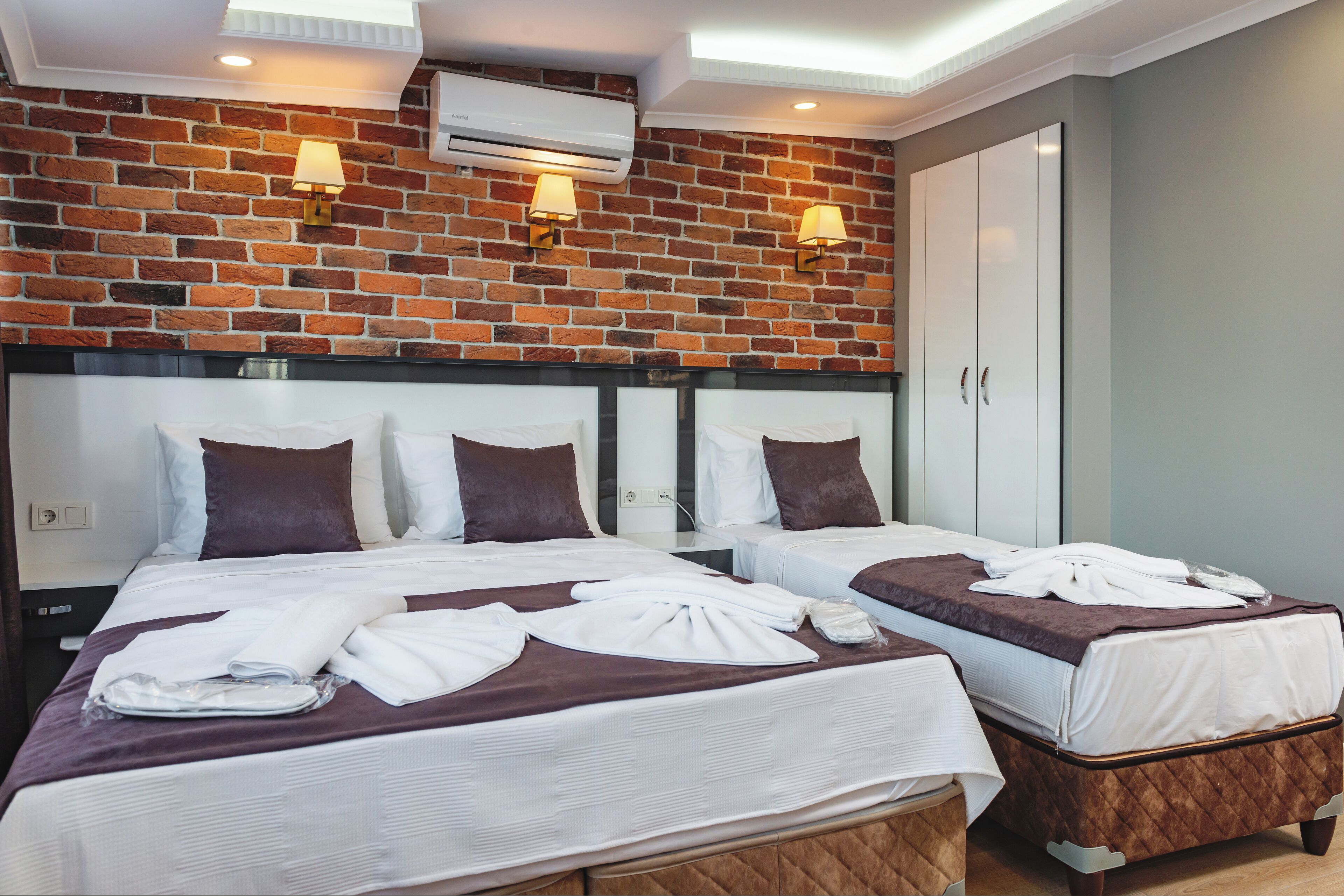 Superior-værelse til 3 personer | Pengeskab på værelset, gratis Wi-Fi