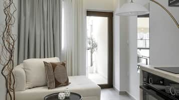 Exclusive Apartment, City View | Living area | 42-inch Smart TV with digital channels