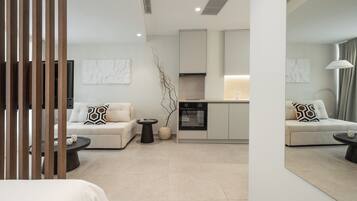 Superior Apartment | Living area | 42-inch Smart TV with digital channels