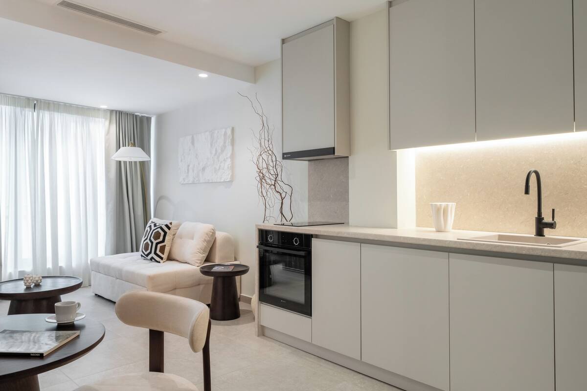 Superior Apartment | Living area | 42-inch Smart TV with digital channels