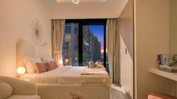 Standard Apartment, Pool View | In-room safe, individually decorated, individually furnished, desk