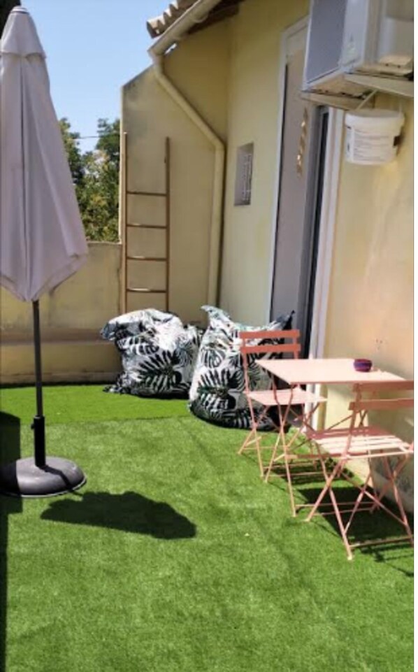 Habitación estándar, patio, vista al jardín | Terraza o patio