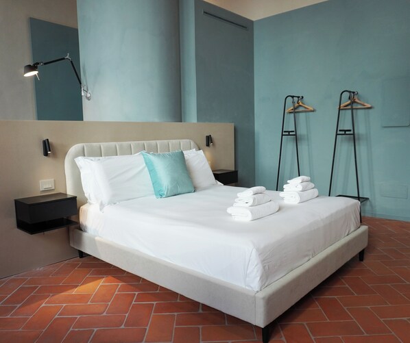 Suite monolocale Deluxe, vista città | Una scrivania, postazione laptop, culle/letti per bambini (a pagamento)