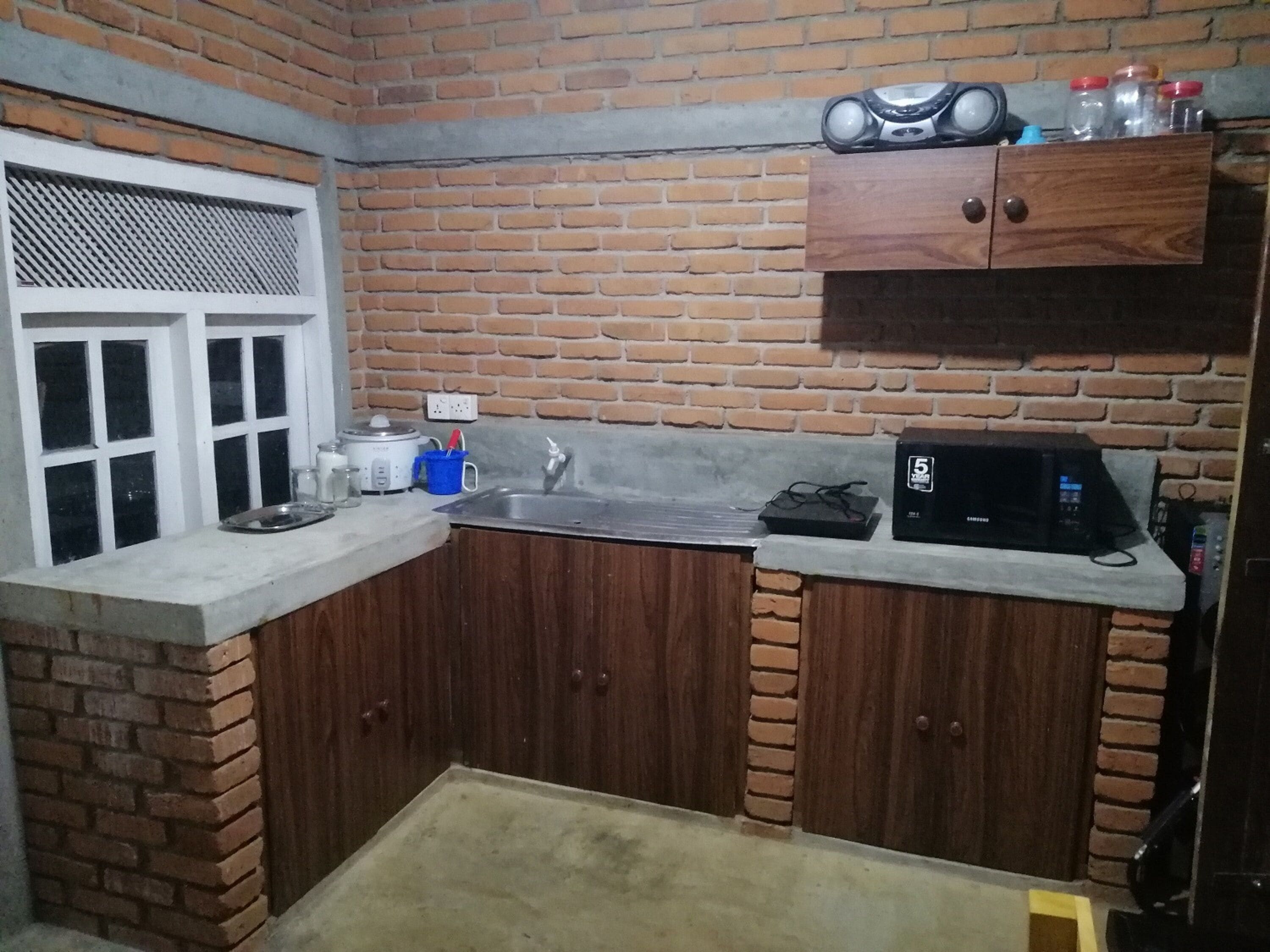 Mini-fridge, microwave, cookware/dishes/utensils