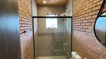 Shower, towels, toilet paper