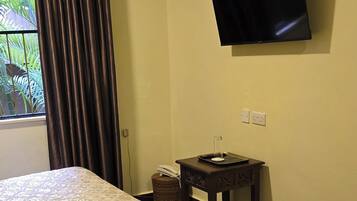 Twin Room, Garden View | In-room safe, desk, laptop workspace, soundproofing