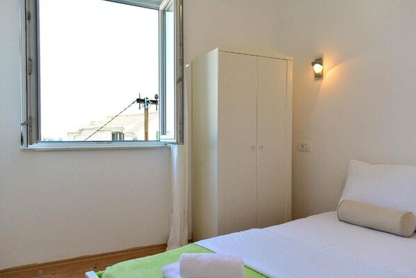 Comfort Quadruple Room, Sea View | Desk, laptop workspace, free WiFi