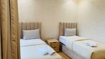 2 slaapkamers, een strijkplank/strijkijzer, wifi, beddengoed