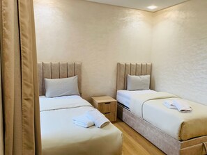 2 slaapkamers, een strijkplank/strijkijzer, wifi, beddengoed