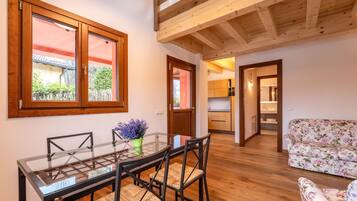 Comfort Apartment, 2 Bedrooms | Living area | 30-inch TV with satellite channels