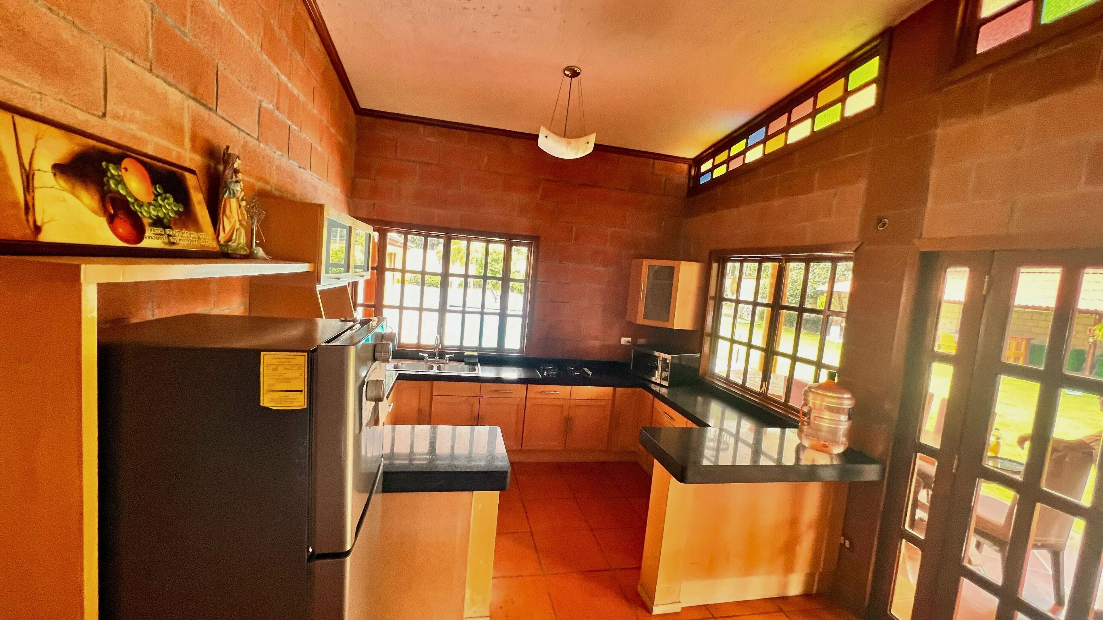 Casa de ciudad familiar, vista a la alberca | Cocina privada