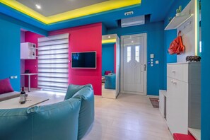 อพาร์ทเมนท์สำหรับครอบครัว | บริเวณนั่งเล่น | ทีวีจอแบน