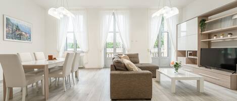 Apartment, 3 Bedrooms, Balcony | Living area | 30-inch TV with satellite channels