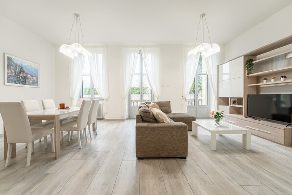 Apartment, 3 Bedrooms, Balcony | Living area | 30-inch TV with satellite channels