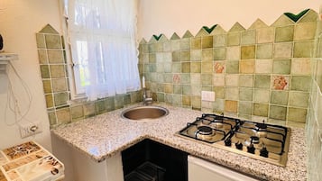Habitació, vistes al mar | Cuina bàsica privada