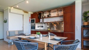Coffee/tea maker, fridge, microwave, oven - Salgados Beach Paradise Apartment with Shared Pool, Wi-Fi, and Air Conditioning (Guia)