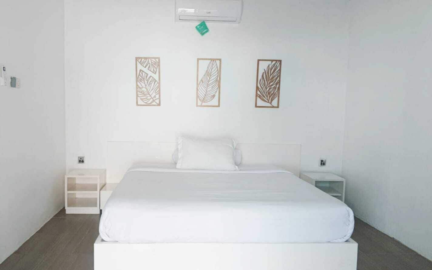 Habitación doble clásica, balcón, vista a la playa | Ropa de cama 