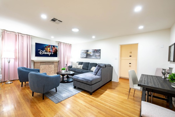 Relax in style with a 65” Smart TV—perfect for cozy family movie nights!