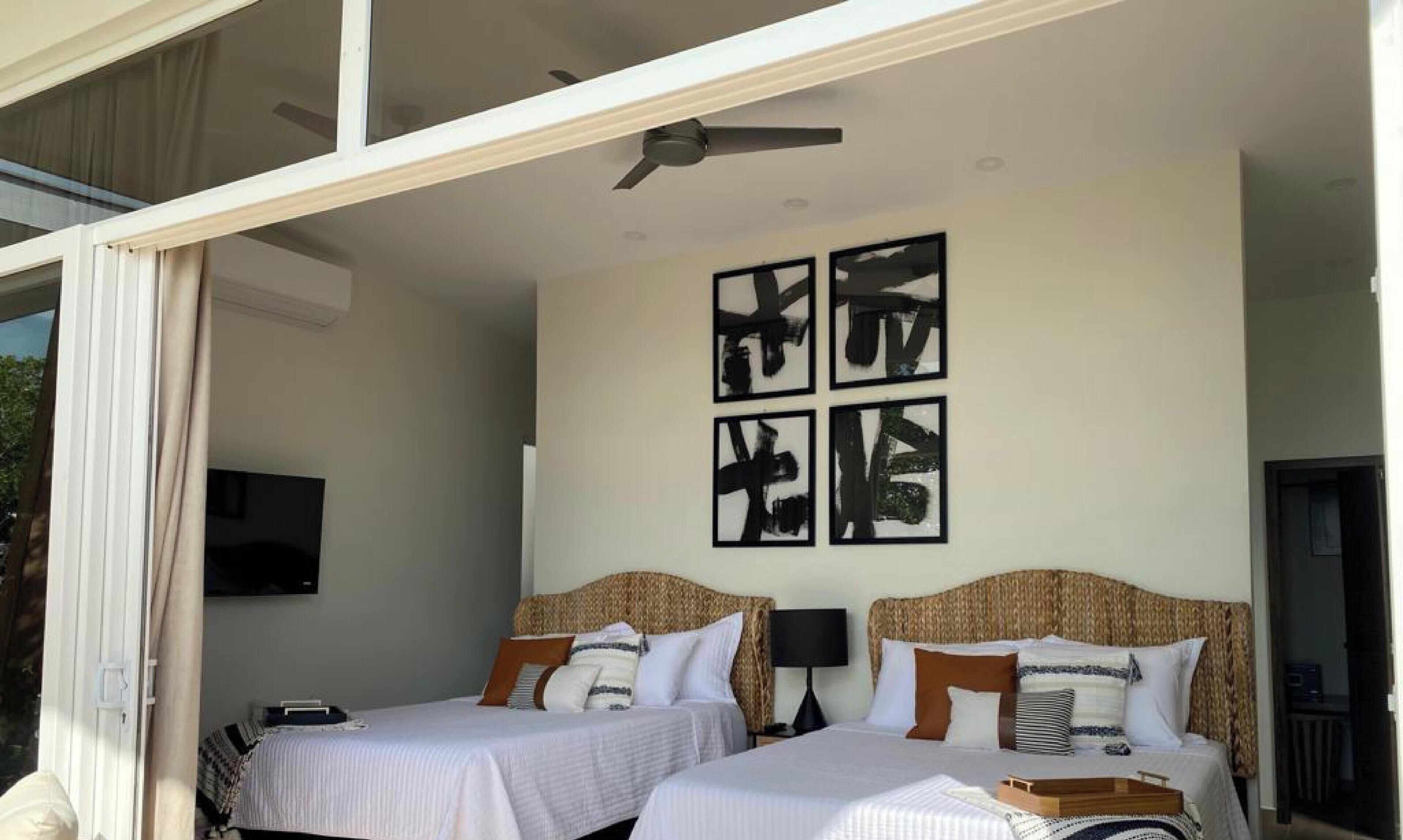 Luxury Villa, 2 Queen Beds, Sea View | In-room safe, laptop workspace, blackout curtains, iron/ironing board