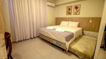 Quarto luxo | Espaço de trabalho para notebook, Wi-Fi de cortesia