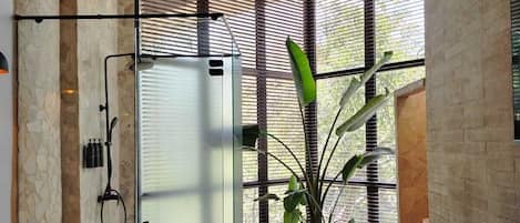 Junior Suite, City View | Bathroom | Shower, rainfall showerhead, free toiletries, towels