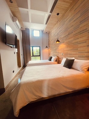 Chambre Quadruple Deluxe, vue ville | Vue sur la ville