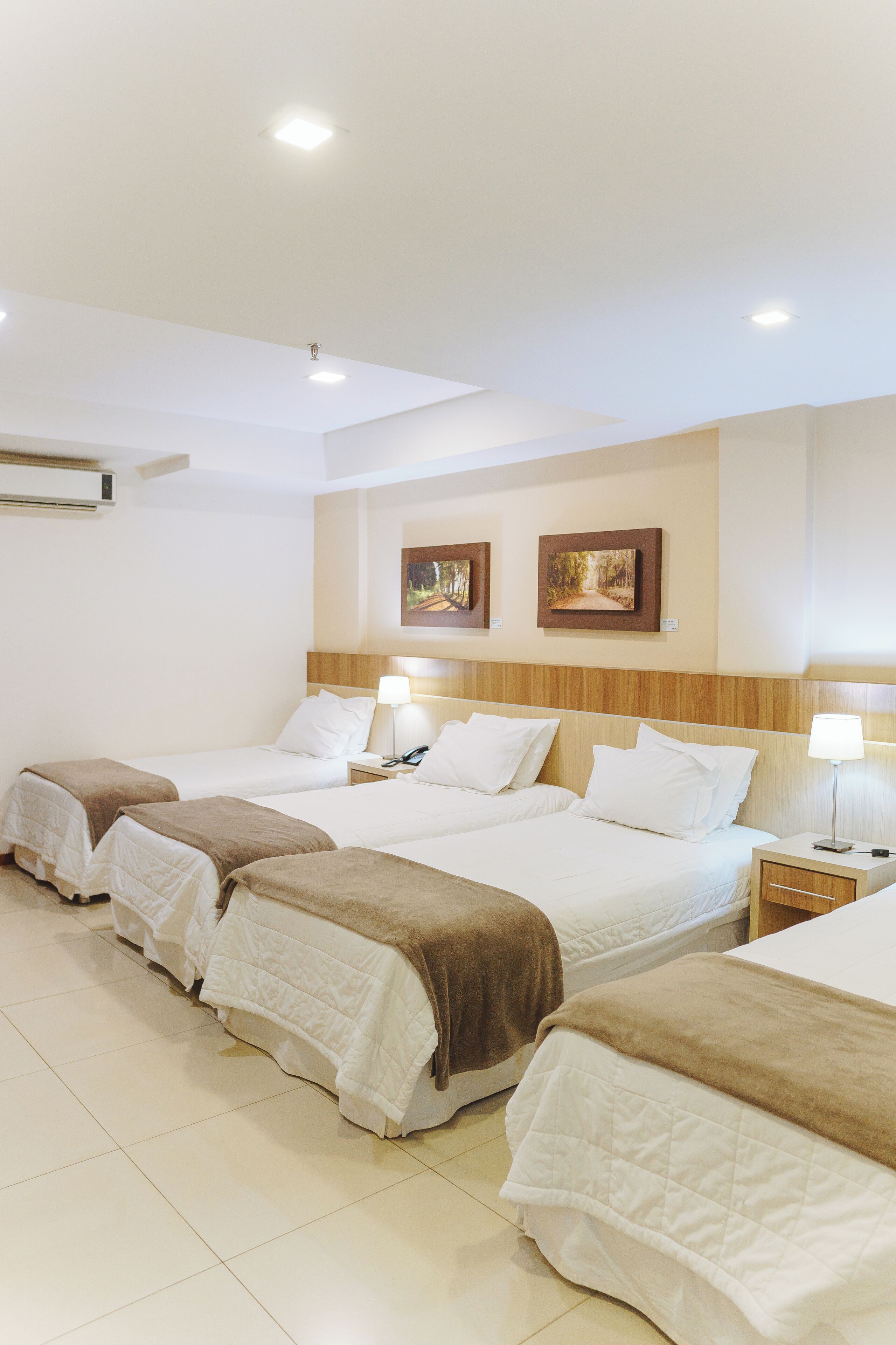 Comfort Quadruple Room | Premium bedding, down comforters, in-room safe, desk