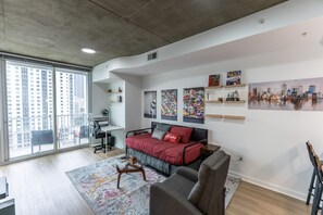House | Living area | Stereo - Midtown Atlanta 1BR Skyline Balcony Corner Condo by Piedmont Park Luxe Pad (Atlanta)