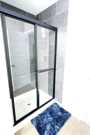 Jetted bath, hair dryer, towels, soap