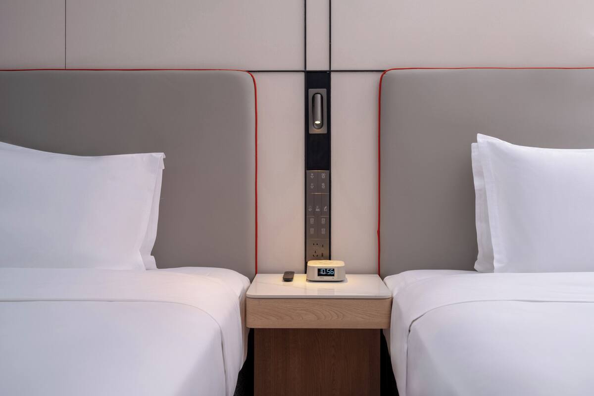 Premium bedding, down comforters, desk, laptop workspace