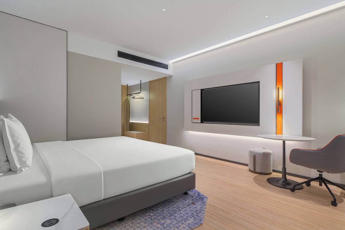 1 King Standard Accessible | Premium bedding, down comforters, desk, laptop workspace