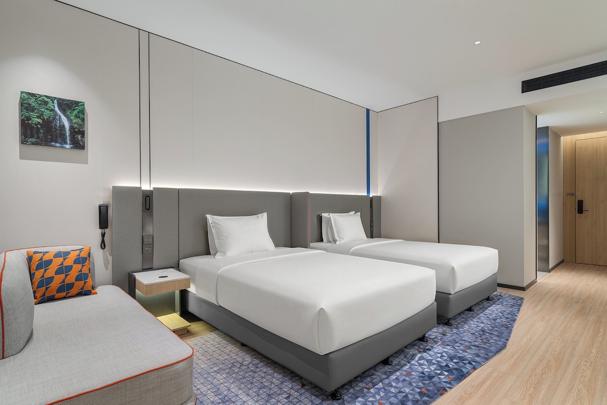 Premium bedding, down comforters, desk, laptop workspace
