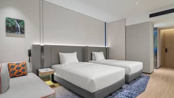 Premium bedding, down duvets, desk, laptop workspace