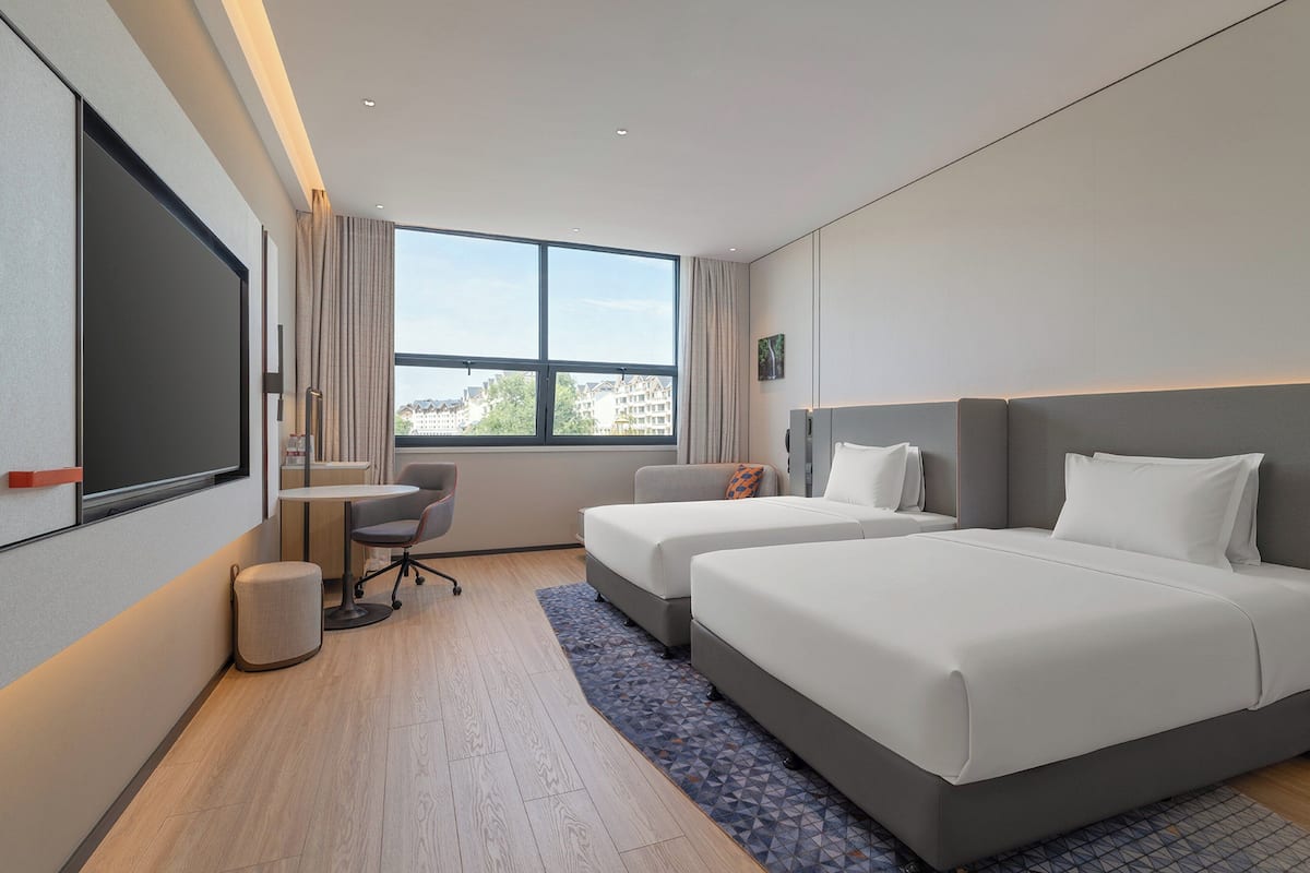 2 Double Standard | Premium bedding, down comforters, desk, laptop workspace