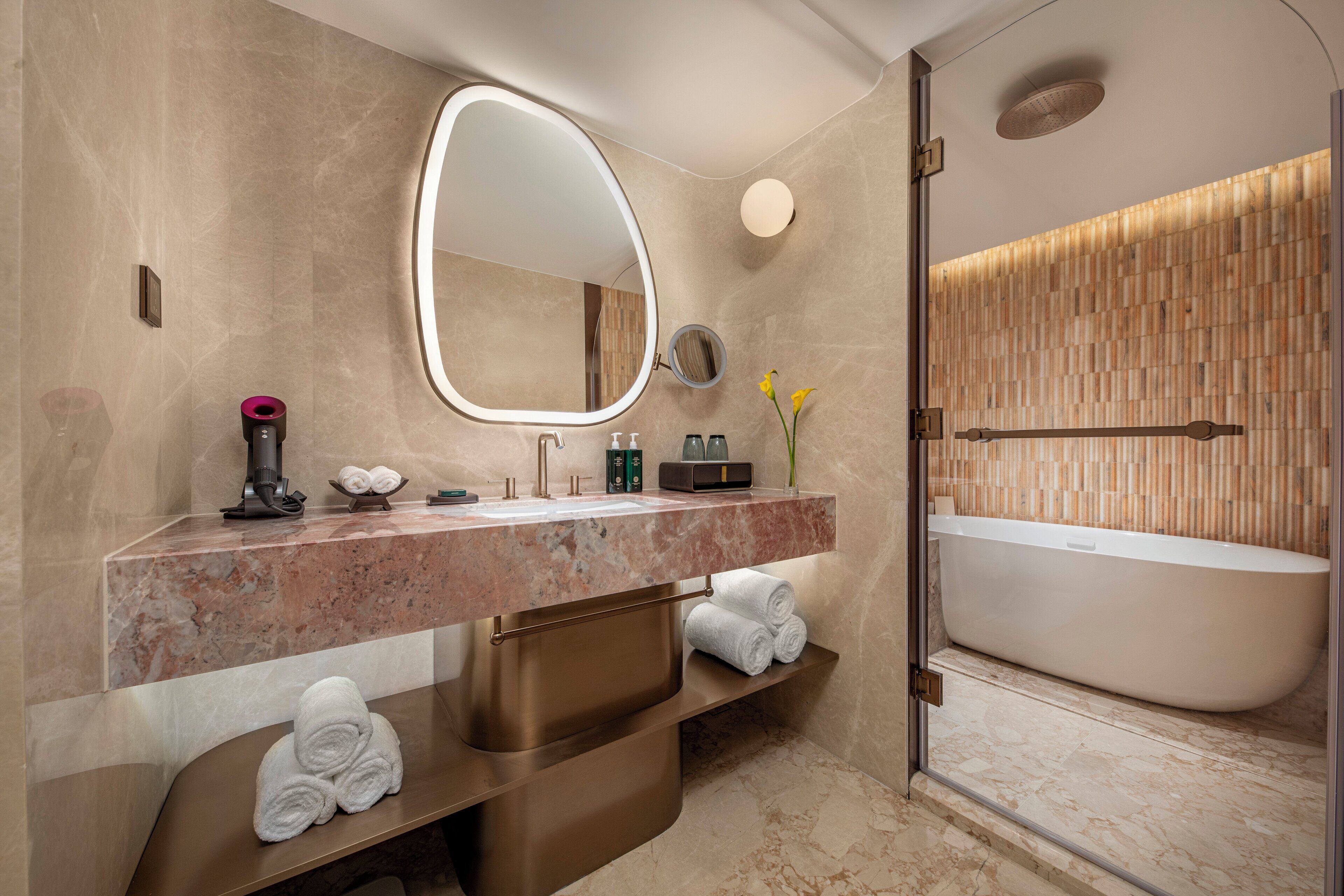 Premium bedding, memory foam beds, free minibar, blackout drapes