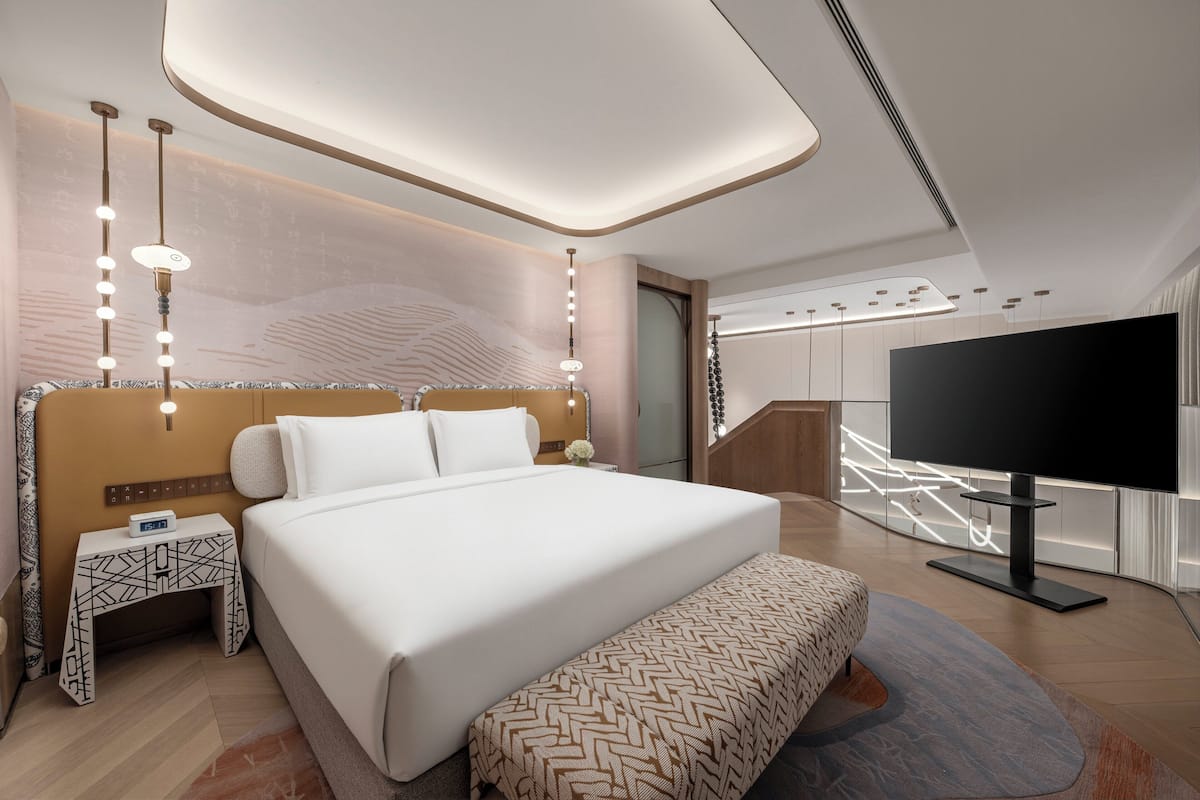 Premium bedding, memory foam beds, free minibar, blackout drapes